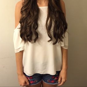 Naked zebra boutique top. White and strappy.